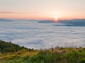 Sunrise over sea fog. Summer mountain landscape. Royalty Free Stock Photo