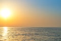Sunrise over the sea horizon, reflections on the water Royalty Free Stock Photo