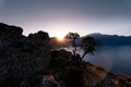 Sunrise over sea and mountains. Rocks and water senery Royalty Free Stock Photo