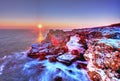 Sunrise over the sea and rocky shore Royalty Free Stock Photo