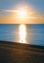 Sunrise Over Sea and Shale Royalty Free Stock Photo