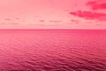 Sunrise over the sea in viva magenta trendy color toning Royalty Free Stock Photo