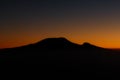 Sunrise over the silhouette of Mount Kilimanjaro and Mawenzi in Tanzania Royalty Free Stock Photo