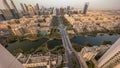 Sunrise over skyscrapers in Barsha Heights district and low rise buildings in Greens district aerial timelapse. Royalty Free Stock Photo