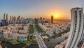 Sunrise over skyscrapers in Barsha Heights district and low rise buildings in Greens district aerial timelapse. Royalty Free Stock Photo