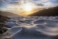 Sunrise over snowfield