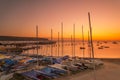 Sunrise over Swanage piers illuminated by the orange pre-dawn Royalty Free Stock Photo