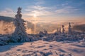 Sunrise over trees under snow near Durkova in Nizke Tatry mountains Royalty Free Stock Photo