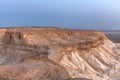 Sunrise over Ustyurt Plateau. District of Boszhir. The bottom of a dry ocean Tethys. Rocky remnants. Kazakhstan. selective focus Royalty Free Stock Photo