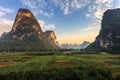 Sunrise over a valley of limestone hills Royalty Free Stock Photo