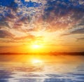 Sunrise over a water Royalty Free Stock Photo