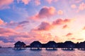 Sunrise over water bungalows in Maldives Royalty Free Stock Photo