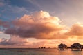 Sunrise over water bungalows in Maldives Royalty Free Stock Photo