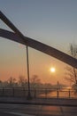 Sunrise over the waterway `Teltowkanal` in Berlin on a misty morning