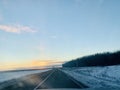 Sunrise over winter road Royalty Free Stock Photo