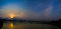 Sunrise Panaroma of lake, the town and Mountain.