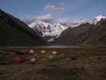 Sunrise panorama of andes mountain Jirishanca tent Camp Jahuacocha lake Cordillera Huayhuash Circuit Ancash Peru Royalty Free Stock Photo