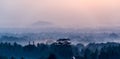 Sunrise panorama of Borobudur valey forest covered with mist from Borobudur temple. Central Java, Indonesia Royalty Free Stock Photo