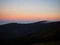 Sunrise panorama of wind turbines farm park on mountain hill top at Baloico do Trevim Lousa swing Coimbra Portugal