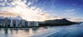 Sunrise panoramic view of the densest parts of Honolulu at Waikiki and its beach and hotels and Diamond Head Royalty Free Stock Photo