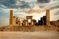 Sunrise in Persepolis, capital of the ancient Achaemenid kingdom. Ancient columns. Sight of Iran. Ancient Persia. Royalty Free Stock Photo