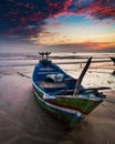 Sunrise and traditional boat tuban beach east java Royalty Free Stock Photo