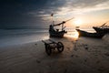 Sunrise and traditional boat tuban beach east java