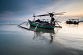 Sunrise and traditional boat tuban beach east java Royalty Free Stock Photo