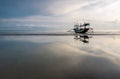 Sunrise and traditional boat tuban beach east java Royalty Free Stock Photo