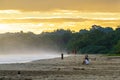 Sunrise at Playa Cocles, beautiful tropical Caribbean beach, Puerto Viejo, Costa Rica east coast, tourists meet the dawn Royalty Free Stock Photo