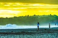 Sunrise at Playa Cocles, beautiful tropical Caribbean beach, Puerto Viejo, Costa Rica east coast, tourists meet the dawn Royalty Free Stock Photo