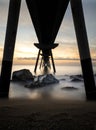 Sunrise on the Pont del petroli beach with silky water.