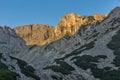 Sunrise with red rocks of Sinanitsa peak and the lake, Pirin Mountain Royalty Free Stock Photo