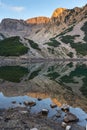 Sunrise with red rocks of Sinanitsa peak and the lake, Pirin Mountain Royalty Free Stock Photo