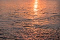 The sunrise reflected into the waves of the Atlantic Ocean