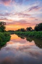 Sunrise reflection in a canal Royalty Free Stock Photo