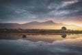 Sunrise reflection morning fog sun beams solo three solo boat