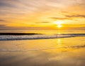 Sunrise Reflection on The Surf at Fernandina Beach Royalty Free Stock Photo