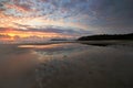 sunrise reflections on the beach at Evans Head in Australia