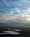 Sunrise reflections on drought stricken Lake Isabella in the southern Sierra Nevada mountains of California Royalty Free Stock Photo