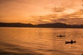 Sunrise with reflections at Lake Toba, Samosir Island, Indonesia. Royalty Free Stock Photo