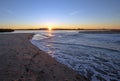 Sunrise reflections over tidal outflow of the Santa Clara river estuary at McGrath State Park of Ventura California USA Royalty Free Stock Photo