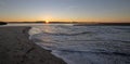 Sunrise reflections over tidal outflow of the Santa Clara river estuary at McGrath State Park of Ventura California USA Royalty Free Stock Photo