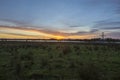 Sunrise, river and agriculture field