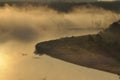 Sunrise. The river in the mist. A view of the meadows and the river in the morning Royalty Free Stock Photo