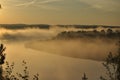 Sunrise. The river in the mist. A view of the meadows and the river in the morning Royalty Free Stock Photo