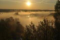 Sunrise. The river in the mist. A view of the meadows and the river Royalty Free Stock Photo