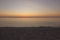 Sunrise on the rocky beach