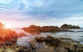 Sunrise on the rocky sea coast Royalty Free Stock Photo