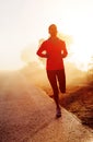 Sunrise running woman Royalty Free Stock Photo